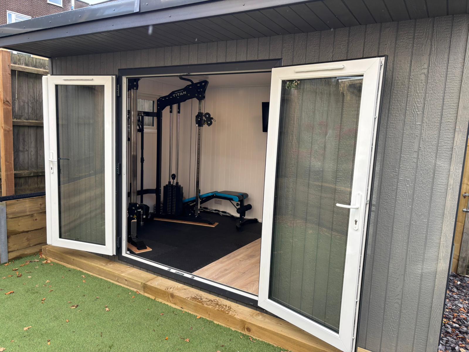 Garden room set up as a home gym