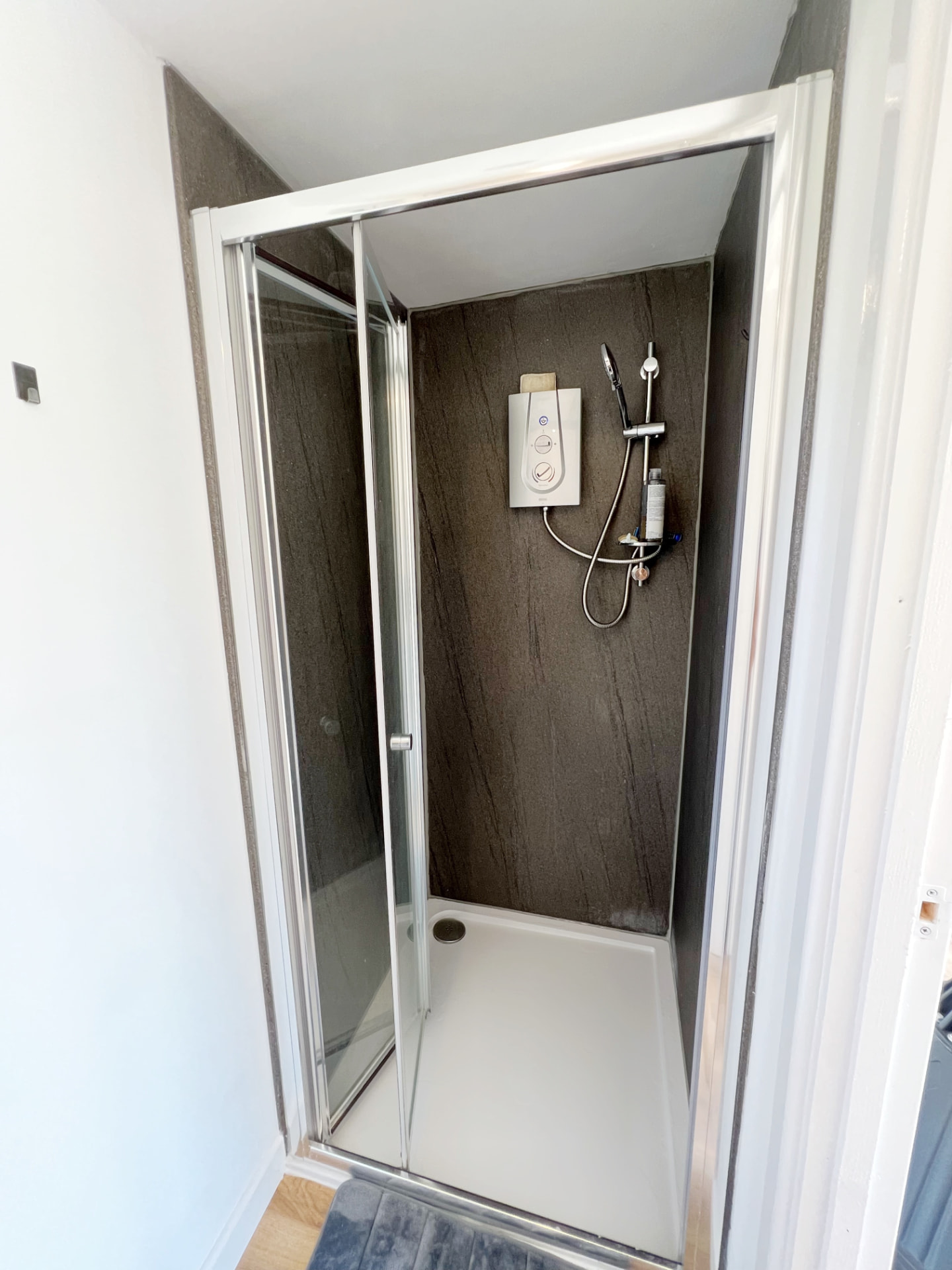 Compact shower room fitted inside a garden room